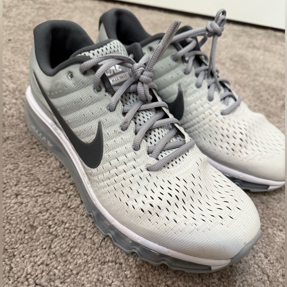 Dark grey and white Nike running shoes
